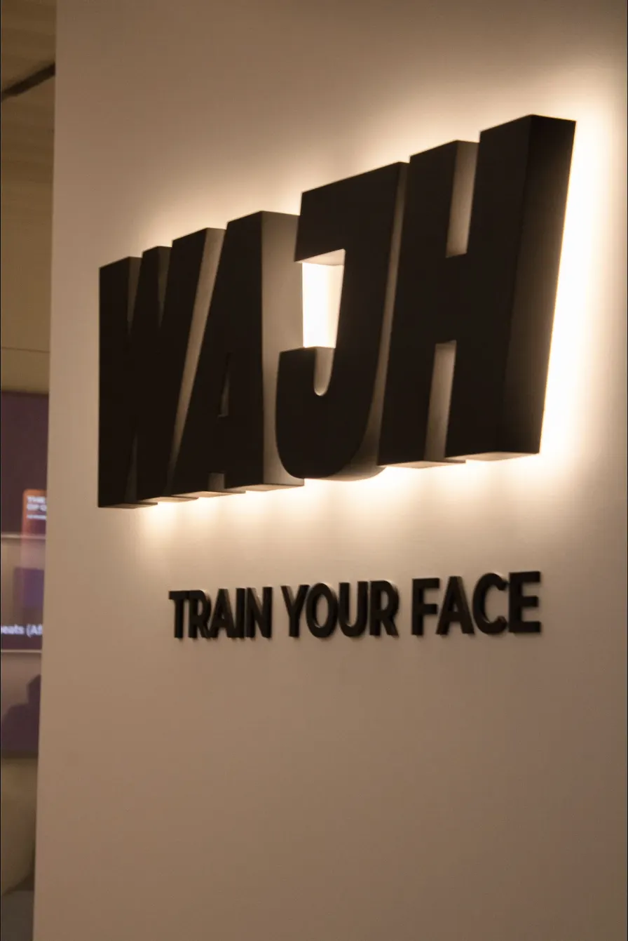 WAJH Train Your Face sign at the studio entrance